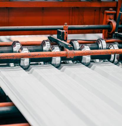 Metal Sheet Corrugated Forming Machine Production Line in Metal Panel Factory.